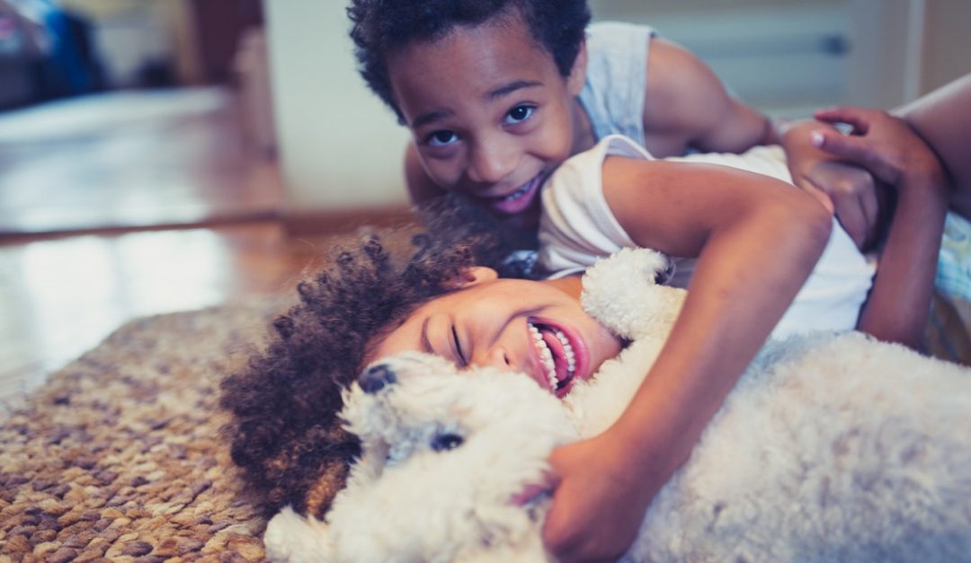 Pros and Cons of Raising Kids With Pets