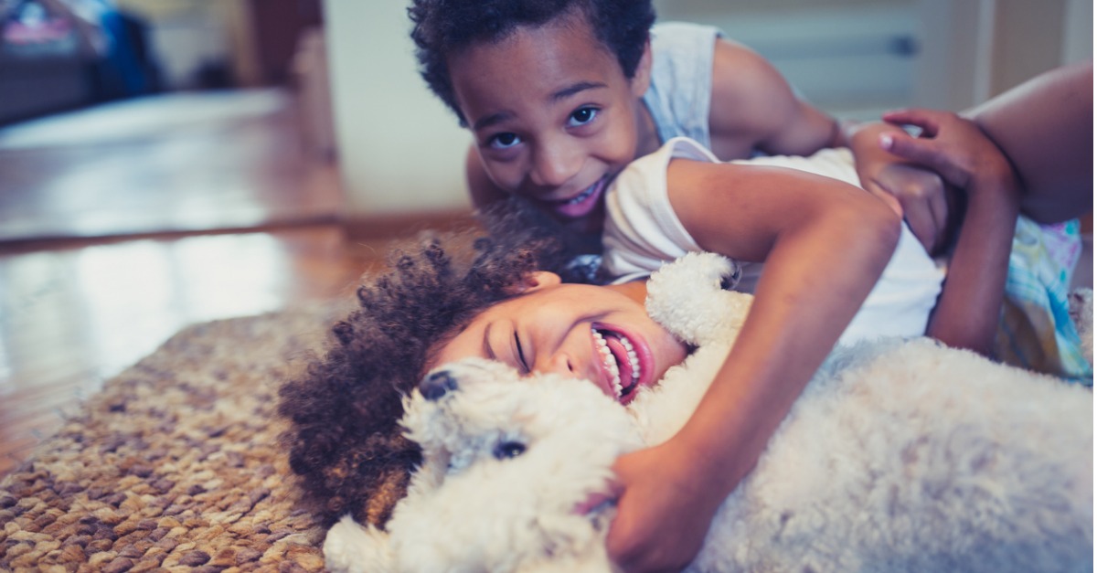 Pros and Cons of Raising Kids With Pets