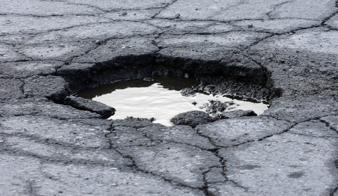 What to Do About a Pothole in Your Driveway