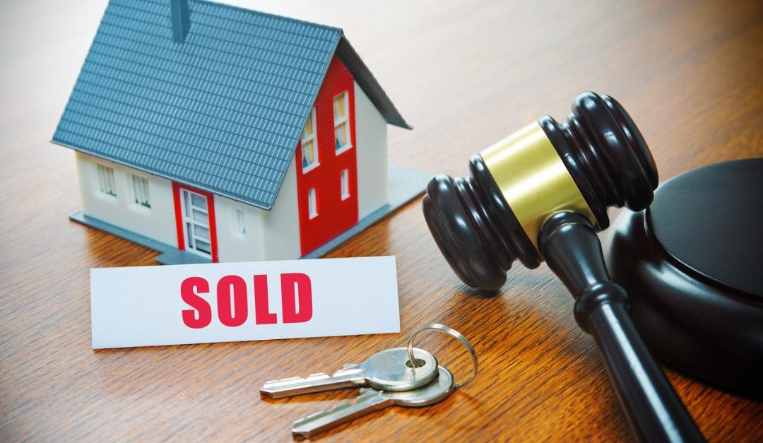 Pros and Cons of Buying a House at Auction